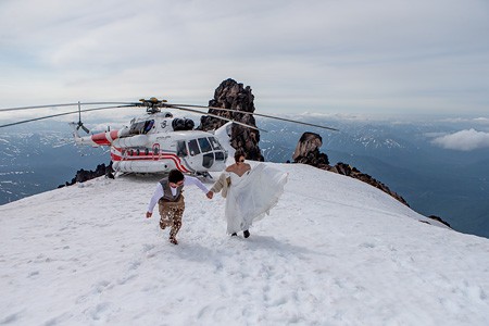 Wedding atop a volcano. Kamchatka, Russia