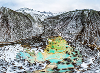 Multi-Colored Pond among mountains
