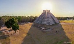 Mexico, Chichen Itza. Sun behind of the Temple of Kukulcan