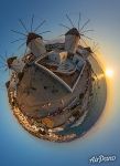 Mykonos windmills at sunset. Planet
