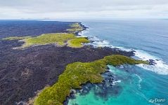 Above the southern coast of Isabela Island