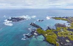 Above the southern coast of Isabela Island Above the southern coast of Isabela Island