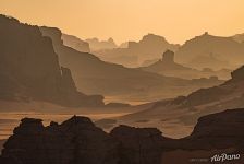 Silhouettes of rocks in the Sahara Desert