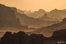 Silhouettes of rocks in the Sahara Desert Silhouettes of rocks in the Sahara Desert