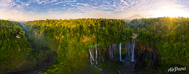 Panorama of Tumpak Sewu Waterfall at sunrise