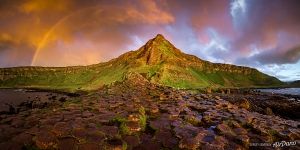 Rainbow above the Giant’s Causeway. Panorama