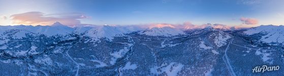 Snow Valley at sunset. Panorama