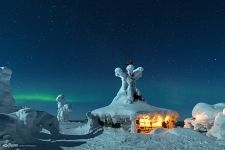 Hut and Northern Lights on the Top of Kuntivaara Hill