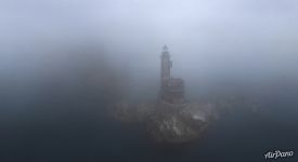 Lighthouse in the fog Lighthouse in the fog