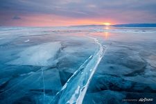 Sunrise, ice crack at Maloe more straight Sunrise, ice crack at Maloe more straight