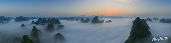 Panorama above clouds and mountains